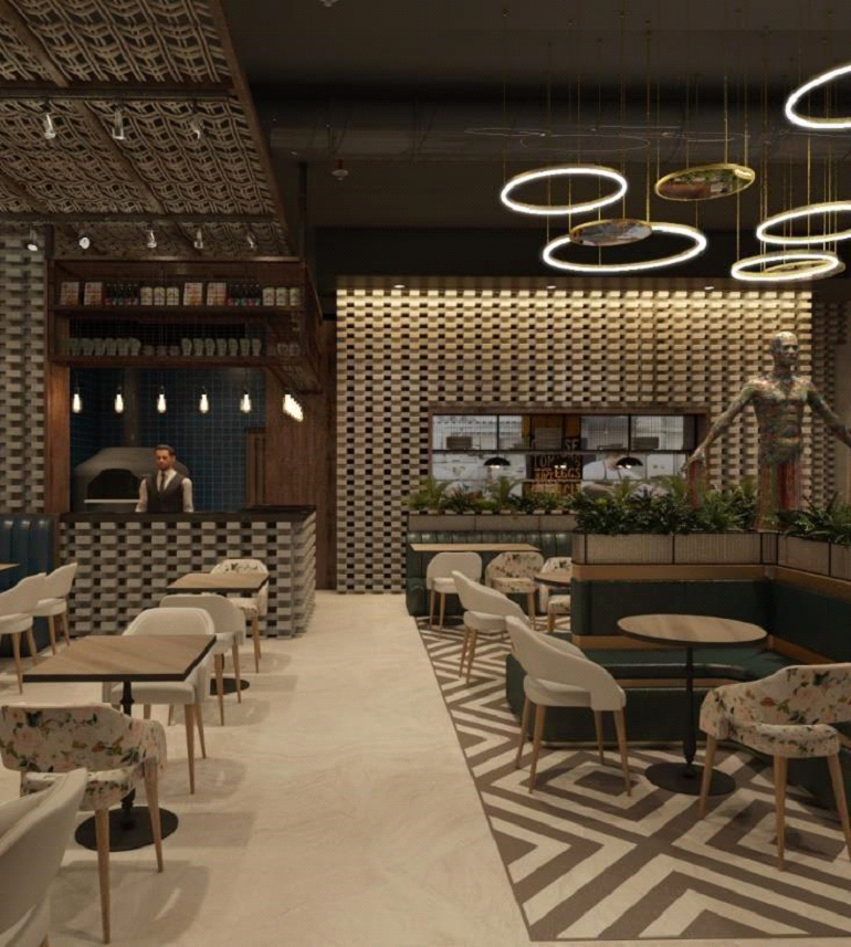 Warm lighting paired with greenery in a restaurant interior